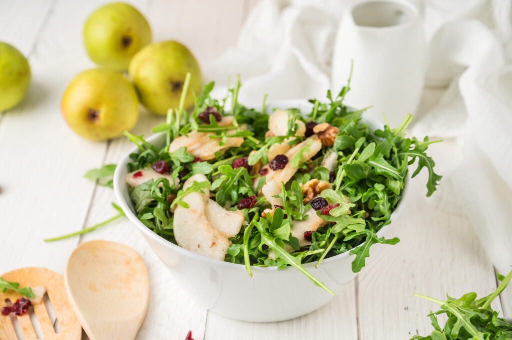 arugula salad in a whit bowl
