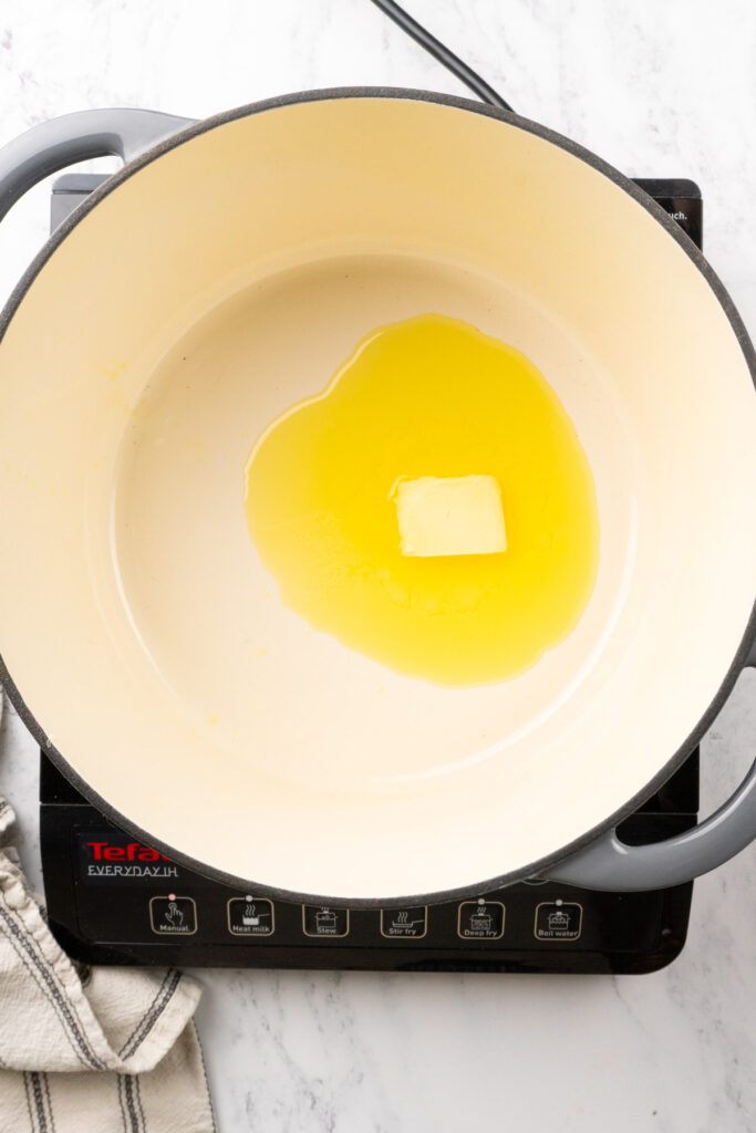 butter in a Dutch oven
