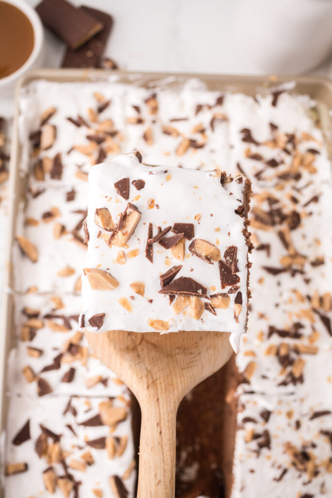 slice of chocolate caramel poke cake