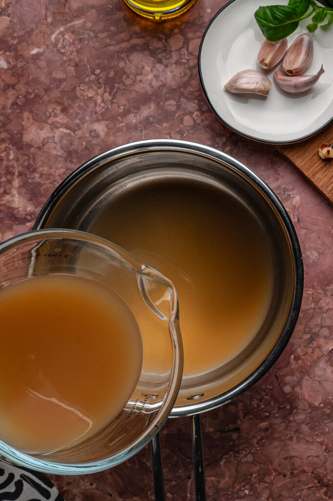 chicken broth in a pot