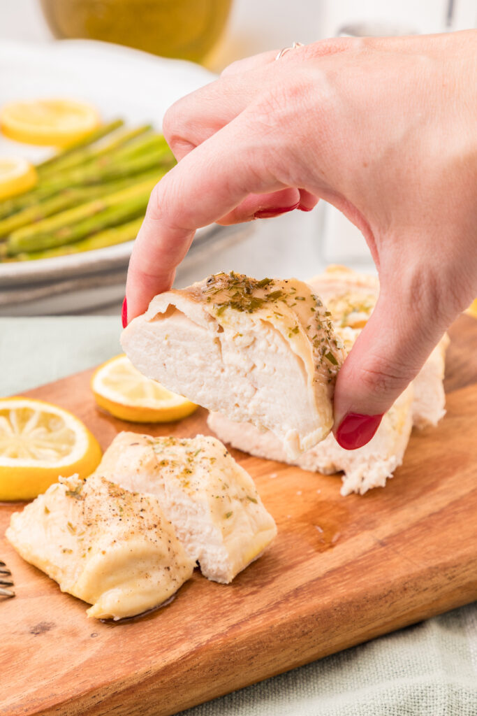 chicken breast on a wooden board